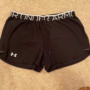 Black Under Armour shorts size medium.